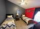 Two twin beds in a bedroom with gray and yellow bedding at 2564 Bear Creek Ct, Kissimmee, FL 34747