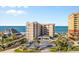 Oceanfront building with parking and pool area visible at 2855 S Atlantic Ave # 304, Daytona Beach Shores, FL 32118