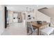 Light and airy dining area with view of the kitchen at 3175 Emerald Acres Ln, Sanford, FL 32771