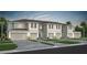 New townhome development with three-unit building, two-car garages, and landscaping at 3175 Emerald Acres Ln, Sanford, FL 32771