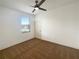 Bright bedroom with ceiling fan and carpeted floor at 3300 Whitestone Cir # 101, Kissimmee, FL 34741