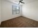 Spacious bedroom with ceiling fan and carpeted floor at 3300 Whitestone Cir # 101, Kissimmee, FL 34741