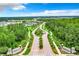 Aerial view of community entrance and roads at 3384 Yellowtop Loop, Clermont, FL 34714