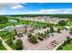 Aerial view of community pool, tennis courts, and parking at 3384 Yellowtop Loop, Clermont, FL 34714