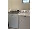 Laundry room with Maytag washer and dryer at 3384 Yellowtop Loop, Clermont, FL 34714