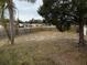 Fenced backyard with large grassy area at 359 Prevo Dr, Apopka, FL 32712