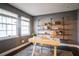 Home office with floating shelves, desk, and natural light at 4491 Yachtmans Ct, Orlando, FL 32812