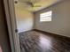 Spacious bedroom featuring wood-look floors and a window at 4706 Kanoy Dr, Lakeland, FL 33805