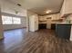 Modern kitchen with dark grey and white cabinets at 4706 Kanoy Dr, Lakeland, FL 33805