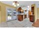 Eat-in kitchen with wood cabinets and French doors at 4806 Hollyberry Dr, Orlando, FL 32812