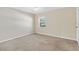 Bright bedroom with neutral walls and carpeting at 4952 Tangerine Ave # 4952, Winter Park, FL 32792