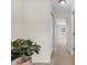 Bright hallway with doors to bedrooms at 4952 Tangerine Ave # 4952, Winter Park, FL 32792