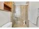 Large walk-in shower with tile surround and glass door at 4952 Tangerine Ave # 4952, Winter Park, FL 32792