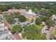 Aerial view of a large building with ample parking and landscaped grounds at 506 N Dillard St, Winter Garden, FL 34787