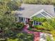 House exterior and landscaping with brick pathway from overhead at 506 N Dillard St, Winter Garden, FL 34787