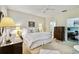 Spacious bedroom with ensuite bathroom access and built-in home office at 506 N Dillard St, Winter Garden, FL 34787