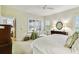 Large bedroom with sitting area and plenty of natural light at 506 N Dillard St, Winter Garden, FL 34787