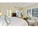 Bright bedroom with sitting area and access to a second bathroom at 506 N Dillard St, Winter Garden, FL 34787