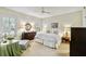 Main bedroom with ample closet space and a calming atmosphere at 506 N Dillard St, Winter Garden, FL 34787