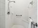 Walk-in shower with built-in seat and grab bars at 506 N Dillard St, Winter Garden, FL 34787