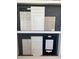 Selection of kitchen cabinets, backsplash and flooring options at 5182 Gardenrow Dr, St Cloud, FL 34772