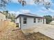 House exterior showcasing a backyard and concrete patio at 644 Maya Susan Loop, Apopka, FL 32712