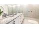 Elegant bathroom with granite countertops and a walk-in shower at 801 Golden Bear Dr, Kissimmee, FL 34747