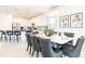 Dining room with marble table and black chairs at 801 Golden Bear Dr, Kissimmee, FL 34747