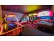 Game room with air hockey, arcade games, and basketball at 801 Golden Bear Dr, Kissimmee, FL 34747