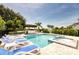 Resort-style pool and spa with outdoor kitchen at 801 Golden Bear Dr, Kissimmee, FL 34747