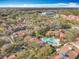 Wide aerial view of the neighborhood, highlighting the community pool and surrounding areas at 832 Grand Regency Pt # 102, Altamonte Springs, FL 32714