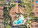 Birds eye view of a well maintained condo building with a pool, landscaping and manicured lawns at 832 Grand Regency Pt # 102, Altamonte Springs, FL 32714