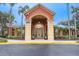 Community building with attractive entryway and landscaping at 832 Grand Regency Pt # 102, Altamonte Springs, FL 32714