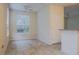 Bright dining area with tile flooring and large window at 832 Grand Regency Pt # 102, Altamonte Springs, FL 32714