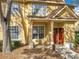 Charming townhouse exterior with a cozy porch and inviting front door at 832 Grand Regency Pt # 102, Altamonte Springs, FL 32714