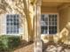 Exterior of the property with well-maintained landscaping and inviting entryway at 832 Grand Regency Pt # 102, Altamonte Springs, FL 32714