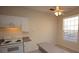 White kitchen with granite countertop at 832 Grand Regency Pt # 102, Altamonte Springs, FL 32714