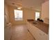 Bright kitchen with white cabinets and tile floors at 832 Grand Regency Pt # 102, Altamonte Springs, FL 32714