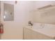 Functional laundry room with washer, dryer, and shelving at 832 Grand Regency Pt # 102, Altamonte Springs, FL 32714