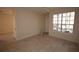 Living room with tile floor and window at 832 Grand Regency Pt # 102, Altamonte Springs, FL 32714