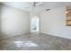 Spacious living room displays tile flooring and ceiling fan at 832 Grand Regency Pt # 102, Altamonte Springs, FL 32714