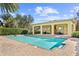 Inviting community pool with covered seating area at 8757 Via Tavoleria Way, Windermere, FL 34786