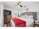 Spacious main bedroom with large TV and comfortable bedding at 922 Wyoming Ave, St Cloud, FL 34769