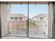 Balcony overlooks community with screen enclosure at 9457 Randal Park Blvd, Orlando, FL 32832