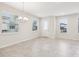 Spacious dining area with tile floors and neutral decor at 9457 Randal Park Blvd, Orlando, FL 32832