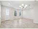 Bright dining room with tile floors and chandelier at 9457 Randal Park Blvd, Orlando, FL 32832