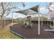 Community playground with shade structure and play equipment at 9457 Randal Park Blvd, Orlando, FL 32832