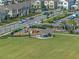 Aerial view of a community with playground, park, and homes at 9693 Lost Creek Dr, Winter Garden, FL 34787