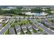 Aerial view of houses and lake in a residential community at 9693 Lost Creek Dr, Winter Garden, FL 34787