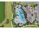 Aerial view of community pool and clubhouse at 9693 Lost Creek Dr, Winter Garden, FL 34787